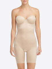 Spanx koreguojantis kostiumas be petnešėlių "Suit Your Fancy Strapless Nude"