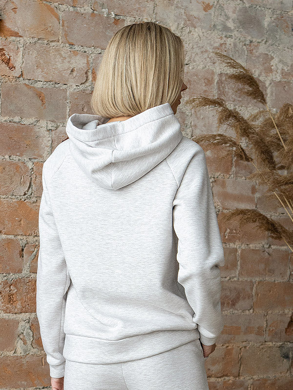 Lega medvilninis džemperis su gobtuvu "Risha Beige Melange"