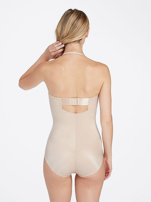 Spanx koreguojantis bodis be petnešėlių "Suit Your Fancy Strapless Nude"