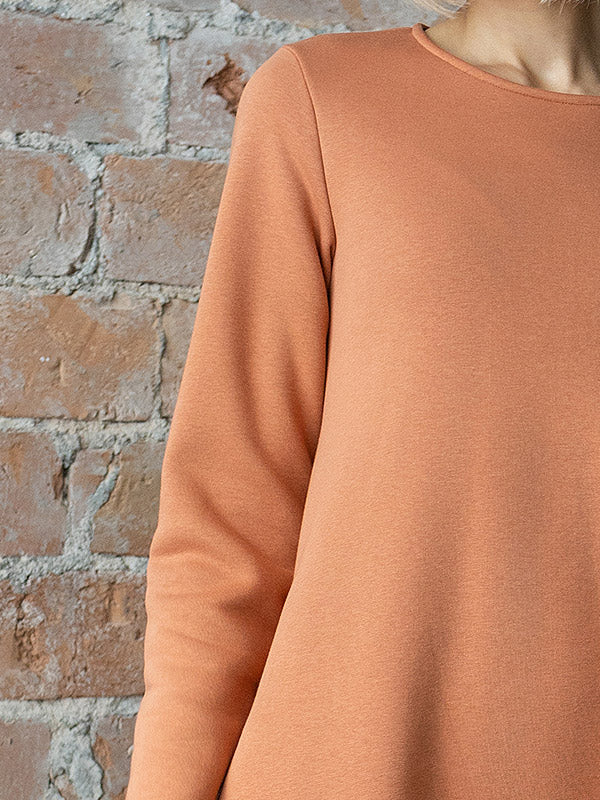 Lega medvilninė suknelė su pūkeliu iš vidaus "Mare Peach"