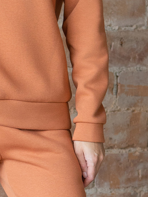 Lega medvilninis džemperis su gobtuvu "Risha Peach"