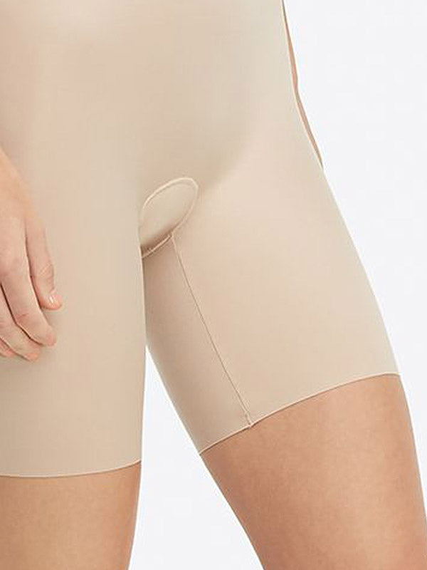 Spanx koreguojantis kostiumas be petnešėlių "Suit Your Fancy Strapless Nude"