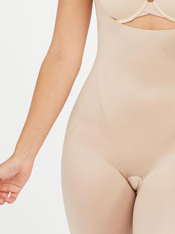 Spanx koreguojantis bodis su atvira krūtine "Thinstincts® Open-Bust Nude"