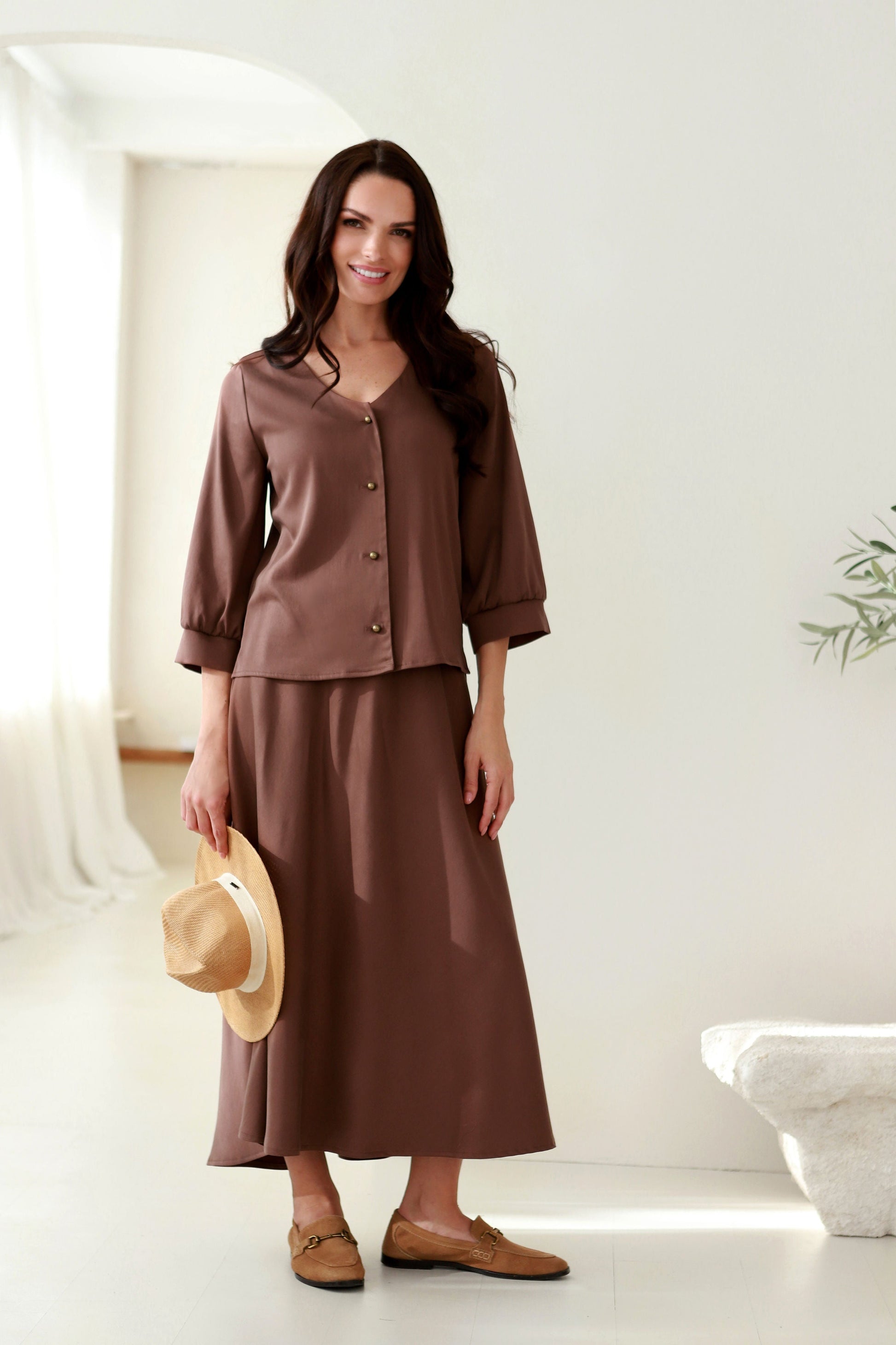 elegantiškas moteriškas sijonas