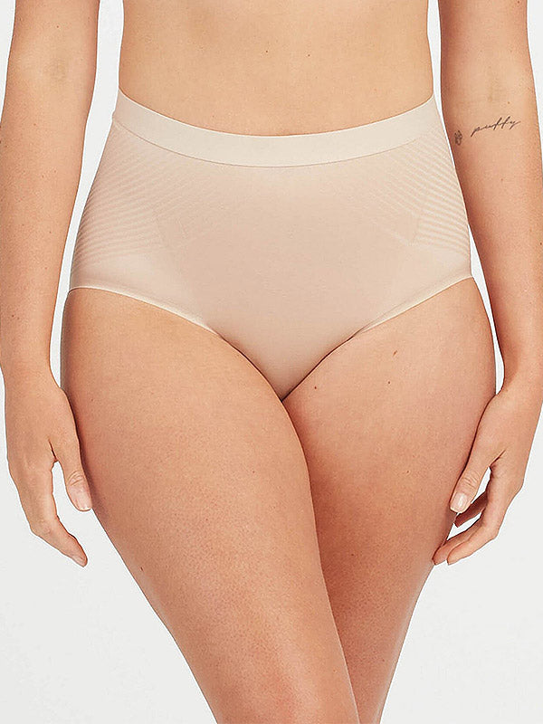 Spanx koreguojančios aukšto juosmens kelnaitės "Thinstincts® Nude"