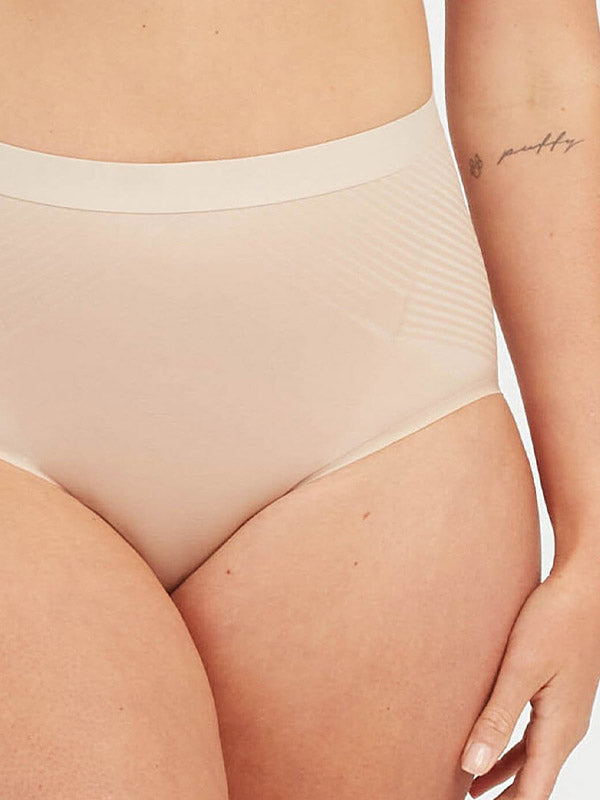 Spanx koreguojančios aukšto juosmens kelnaitės "Thinstincts® Nude"