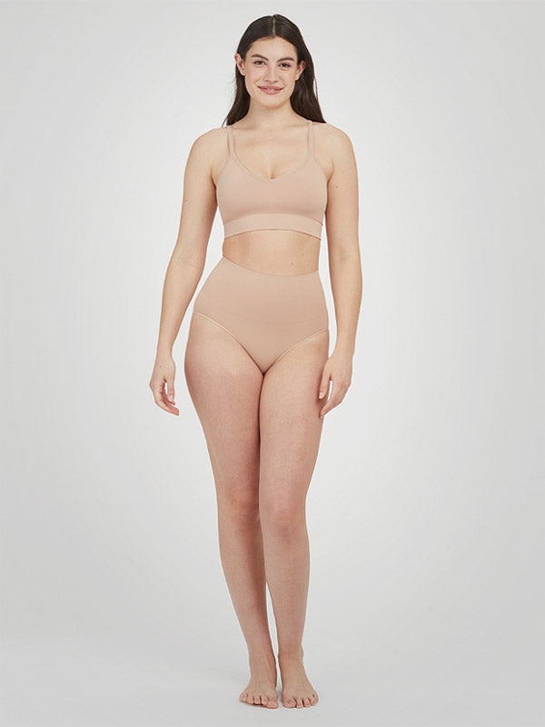 Spanx koreguojančios paaukštinto juosmens kelnaitės iš perdirbto nailono "Ecocare Nude"