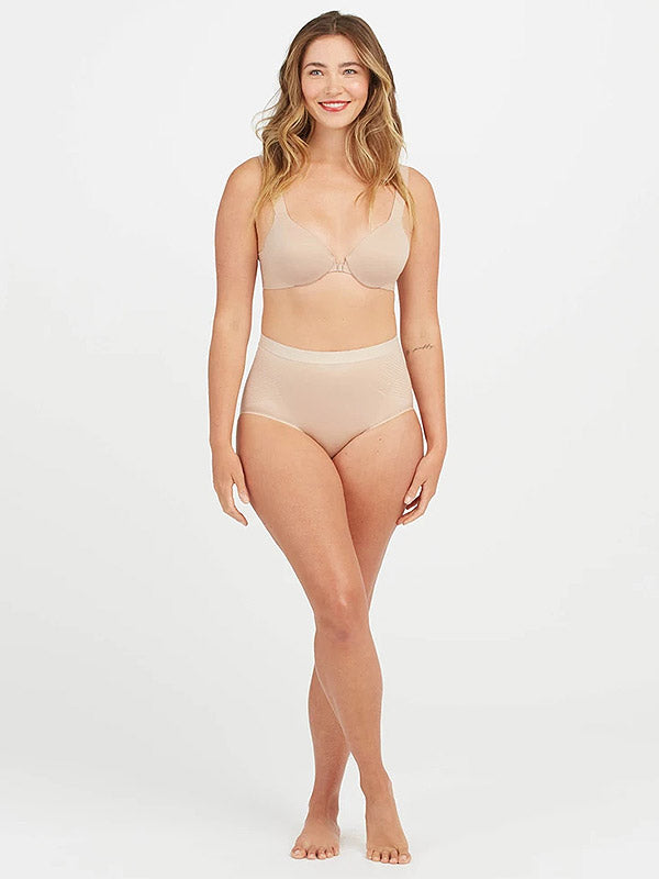 Spanx koreguojančios aukšto juosmens kelnaitės "Thinstincts® Nude"